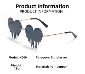 Detail of creative heart shaped melting sunglasses with gold metal frame and PC lenses