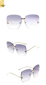 Trois angles de lunettes de soleil sans monture dégradé gris et cadre en métal doré