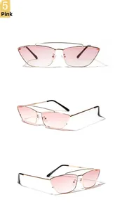 Vue détaillée des lunettes de soleil œil-de-chat avec monture dorée et verres dégradés