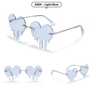 Detail of K009 heart shaped rimless sunglasses with light blue melting effect lenses