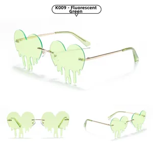 Detail view of heart-shaped melting sunglasses in fluorescent green with gold metal temples