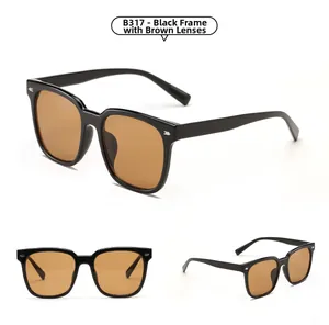 Detail view of square hip-hop sunglasses with black frames and brown lenses