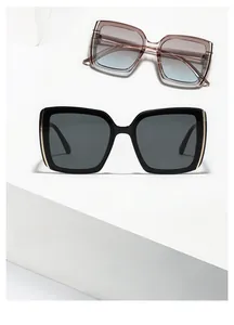 Détail des lunettes de soleil carrées Modèle 9127 avec accents dorés et verres dégradés