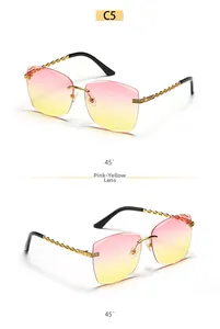 Detail of rimless square sunglasses with pink-yellow gradient lenses and golden chain arms