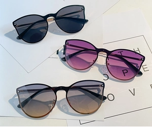 Three-color set of cat-eye rimless sunglasses with metal temples in gradient shades
