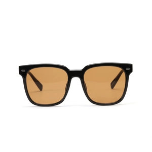Square oversized hip hop sunglasses with black frames and tinted amber lenses