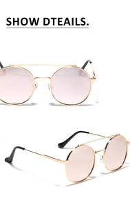Front and 45-degree views of retro gold metal sunglasses with pink lenses and double bridges