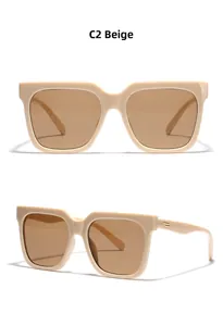 Detail of square beige sunglasses with metal accents and tinted lenses from two angles