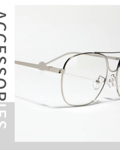 Close-up of vintage silver double-bridge metal glasses frame with high-quality hinges