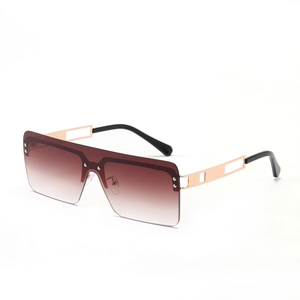 Frameless oversized square sunglasses with gradient brown lenses and gold metal temples