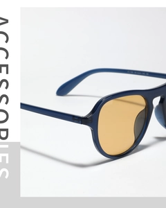 Detail of blue translucent sunglasses frame with amber lenses and CE model markings