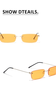 Détail de lunettes de soleil rectangulaires sans monture, verres orange et branches dorées