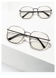 Close-up of model X1330 square metal frames with textured bridge and CE marking
