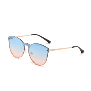 Frameless cat-eye sunglasses with blue-pink gradient lenses and gold metal frames