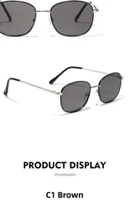 Detail view of square metal sunglasses in brown with classic silver temples and gray lenses