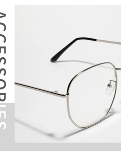 Detail of silver square metal eyeglasses frame with slim temples and smooth finish