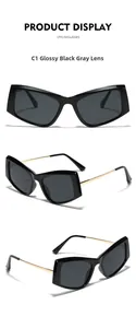 Detailed views of oversized cat-eye sunglasses with gold metal temples and black frame