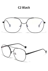Detail view of black metal double-bridge pilot glasses frames with circular temple tips
