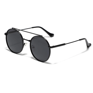 Modern double bridge metallic sunglasses with round black lenses and vintage aesthetics