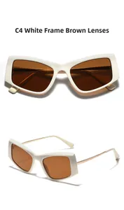 Oversized beige cat-eye sunglasses with tea lenses and golden metal temples detail