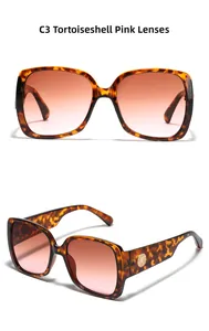 Détails de lunettes de soleil oversize écailles avec rivets et verres dégradés marron