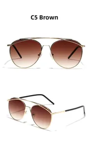 Detailed view of C5 brown gradient aviator sunglasses with gold double-bridge metal frame