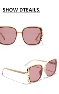 Detailed macro view of cream square sunglasses frame with striped gold metal hinges