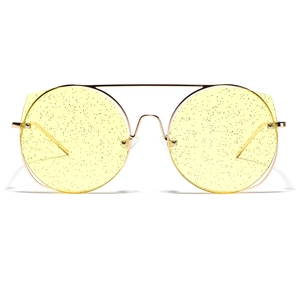Lunettes de soleil oversize en métal doré avec verres ronds jaunes pailletés et double pont