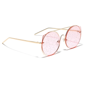 Lunettes de soleil rondes en métal doré avec verres pailletés roses et double pont