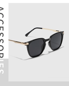 Vista detallada de gafas de sol TR90 polarizadas con patillas de metal dorado y TR7001