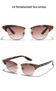 Vue détaillée de lunettes de soleil œil-de-chat à monture écaille et strass brillants