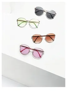 Detailed view of model N3449 metal cat eye sunglasses in four assorted lens colors