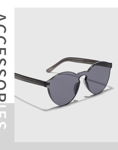 Detail view of grey rimless sunglasses with specs F9371 61-12-140 on the temple arm