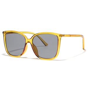 Y2K oversized square sunglasses with transparent amber frame and dark lenses