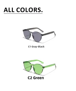 Detail view of heart-shaped rimless sunglasses with metal hinges in grey and green colors