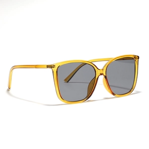Y2K square oversized sunglasses with transparent amber frames and dark grey lenses