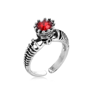 Gothic skull crown ring with red gemstone and spinal bone band in retro silver