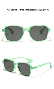 Detail of square oversized sunglasses with translucent green frame and grey lenses