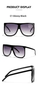 Detailed views of bright black oversized square sunglasses with gradient purple lenses