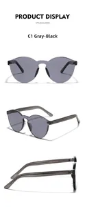 Detailed views of grey black rimless sunglasses featuring modern integrated nose pads