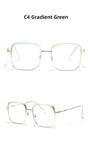 Detail view of square TR90 frame with green gradient finish and golden metal temples