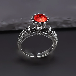 Gothic skull ring with red faceted gemstone and rib-shaped silver alloy adjustable band