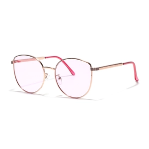 Pink cat eye sunglasses with rose gold metal frame and transparent lenses for women