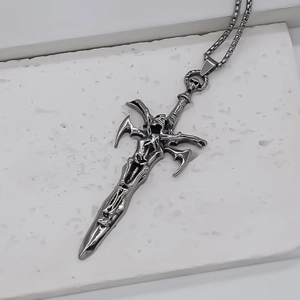 Gothic sword pendant necklace with skull details on box chain for men in vintage silver