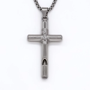 Detailed view of silver cross whistle pendant on a sturdy square box chain necklace