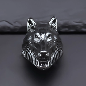 Detailed wolf head ring in vintage black metal with intricate punk hair textures
