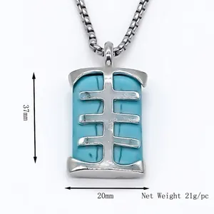 Vintage steel necklace with turquoise rectangular pendant and geometric cross pattern