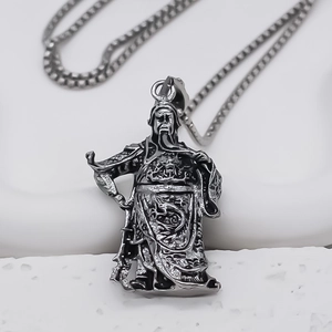 Macro shot of Guan Yu relief pendant necklace with vintage silver metal finish