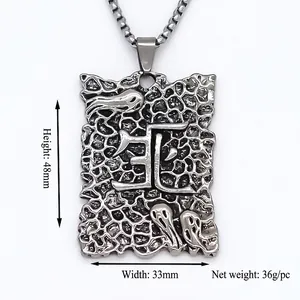 Square pendant necklace with textured stone finish and ghost relief in dark gunmetal