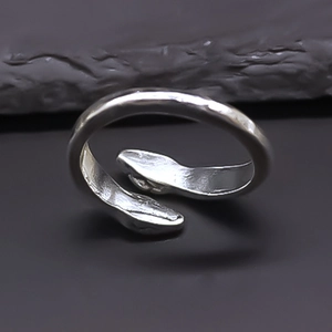 Detailed view of adjustable silver matte double snake ring with minimalist design